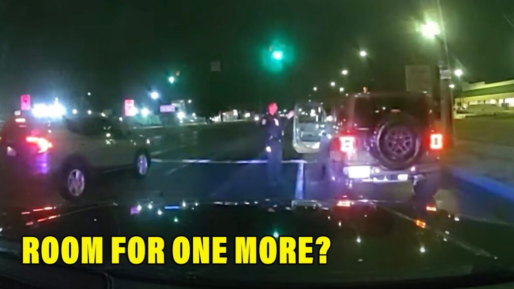  Watch A Cop Cling On To A Stolen Jeep When Driver Flees Traffic Stop