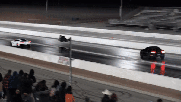 Watch Mustang Driver Lose Control And Slam Into Wall While Drag Racing Corvette Z06